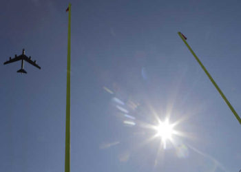 An Air Force B-52 Statofortress, assigned to the 343b Bomb Squadron, conducts a flyover over Capital One Field prior to an NCAA college football game between Maryland and Michigan, Saturday, Nov. 2, 2019, in College Park, Md. (AP Photo/Julio Cortez)