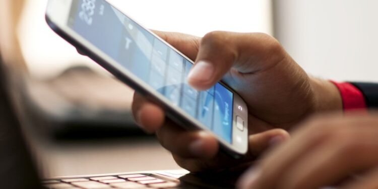 Businessman using smart phone