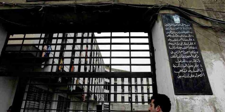 A Lebanese man arrives to pay a visit to a prisoner at Roumieh prison, northeast of Beirut, 07 April 2006. The detention centre, one of the biggest in the Middle East, holds 4,500 inmates but has a capacity of only 1,500. Lebanese writer Omar Nashabeh wrote a book about Roumieh prison, which took four years to be published, and is an attempt to reveal the inmate culture, their relations with guards and with colleagues. AFP PHOTO/RAMZI HAIDAR (Photo by RAMZI HAIDAR / AFP)