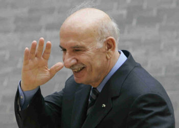 FILE - Legislator Hussein al-Husseini, a former parliament speaker waves his hand as he leaves the parliament building after he announced he was quitting his parliamentary seat to protest an Arab-brokered deal that produced a Cabinet of opposing factions, in Beirut, Lebanon, Tuesday, Aug. 12, 2008. Husseini died Wednesday, Jan. 11, 2023 after days of illness, he was the father of the 1989 Taif Agreement that ended the country's 15-year civil war. He was 85. (AP Photo/Hussein Malla, File)