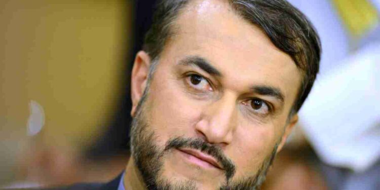 Iranian Deputy Foreign Minister Hossein Amir-Abdollahian gives a press conference at Bayan palace in Kuwait city on March 31,201 on the sidelines of a Syria donors conference. Iran warned that the Saudi "attack" on Yemen endangered the whole region, calling for an immediate halt to the military operation against Shiite rebels. "The fire of war in the region from any side... will drag the whole region to play with fire. This is not in the interest of the nations in the region," Abdollahian said.  AFP PHOTO / STR
        (Photo credit should read STR/AFP via Getty Images)