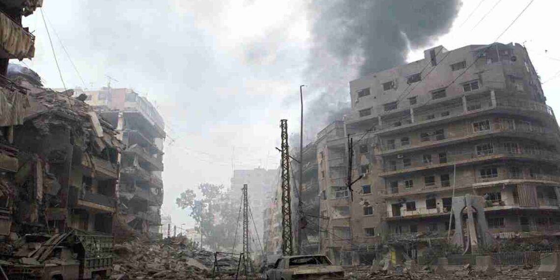 Smoke rises from a building at the Beir al-Abed area in the southern Lebanese suburb of Dahyieh Junubiya, a Hezbollah stronghold, following Israeli air raids 16 July 2006. The death toll from Israel's five-day-old offensive against Lebanon topped 100 Sunday following the death of a civilian in an air raid near the southern port of Tyre.   AFP PHOTO/ANWAR AMRO (Photo credit should read ANWAR AMRO/AFP/Getty Images)