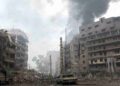 Smoke rises from a building at the Beir al-Abed area in the southern Lebanese suburb of Dahyieh Junubiya, a Hezbollah stronghold, following Israeli air raids 16 July 2006. The death toll from Israel's five-day-old offensive against Lebanon topped 100 Sunday following the death of a civilian in an air raid near the southern port of Tyre.   AFP PHOTO/ANWAR AMRO (Photo credit should read ANWAR AMRO/AFP/Getty Images)