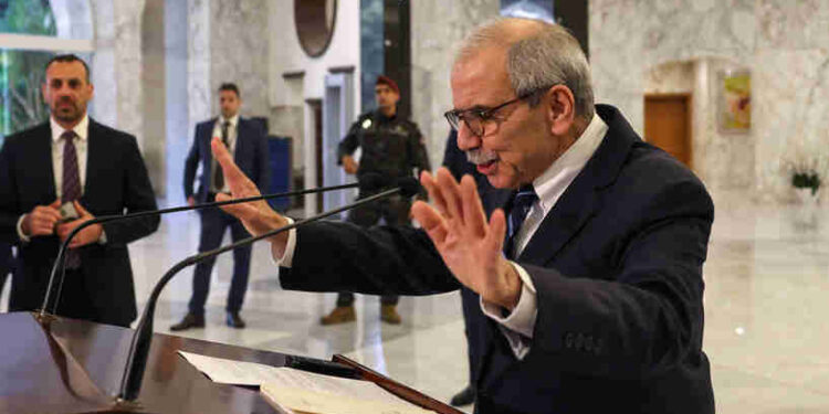 Lebanon's new prime minister-designate Nawaf Salam delivers a statement at the presidential palace in Baabda, east of Beirut, on January 14, 2025. Lebanon's President on January 13 picked international jurist Salam to form a government to pull the war-scarred country out of economic crisis, after two years of a caretaker government. (Photo by Anwar AMRO / AFP)